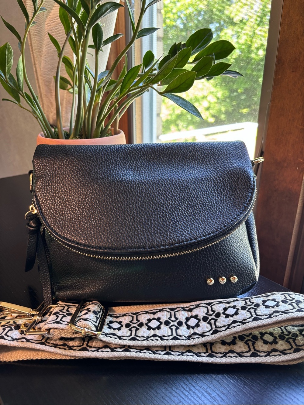 Black Pebbled Leather Crossbody Bag with Patterned Detachable Strap